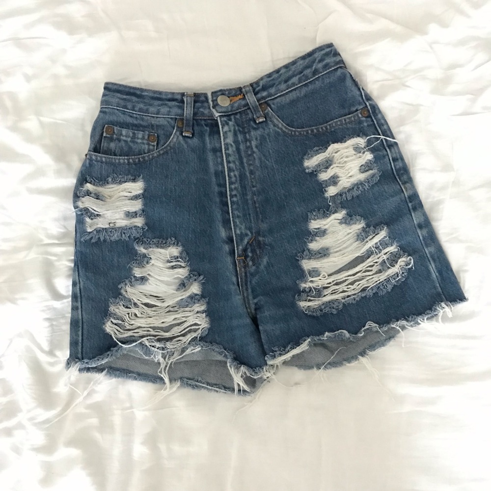 Vintage Levi’s denim shorts (distressed)